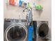 Spacious laundry room with new washer and dryer units and storage at 6918 Diamond Dr, Rex, GA 30273