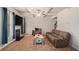 Cozy living room with coffered ceilings, a fireplace, and comfortable furnishings at 6918 Diamond Dr, Rex, GA 30273