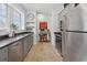 Updated kitchen featuring stainless steel appliances and ample counter space at 1026 Saint Charles Ne Ave # 8, Atlanta, GA 30306