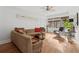 Inviting living room with hardwood floors, a cozy sectional sofa, and ample natural light at 1026 Saint Charles Ne Ave # 8, Atlanta, GA 30306