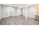 Spacious basement with new flooring, neutral paint and open layout at 1107 Leslie Pl, Lithonia, GA 30058