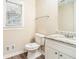 Bathroom features a white vanity with granite countertop at 1107 Leslie Pl, Lithonia, GA 30058