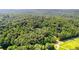 A home surrounded by lush greenery and rolling hills at 12550 Hutcheson Ferry Rd, Palmetto, GA 30268
