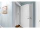 Hallway view showing access to storage room at 12550 Hutcheson Ferry Rd, Palmetto, GA 30268