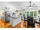 Kitchen and breakfast nook featuring stainless appliances, an island and granite countertops at 12550 Hutcheson Ferry Rd, Palmetto, GA 30268