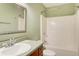 Bathroom with vanity, mirror, bathtub and shower at 155 Skyview Dr, Social Circle, GA 30025