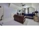 Cozy bedroom featuring vaulted ceilings, neutral carpet, and a ceiling fan at 16 Cambridge Way, Cartersville, GA 30121