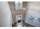 A two-story foyer features a chandelier, staircase, and front door at 16 Cambridge Way, Cartersville, GA 30121