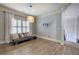Bright living room with hardwood floors, plantation shutters, and stylish decor at 16 Cambridge Way, Cartersville, GA 30121
