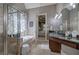 Bathroom showing tub, glass shower, and double vanity at 16 Cambridge Way, Cartersville, GA 30121