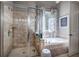 Bathroom showcasing soaking tub, glass shower, and patterned tile at 16 Cambridge Way, Cartersville, GA 30121