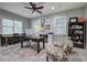 Comfortable home office with natural light, functional desk space, and stylish seating area for productivity at 16 Cambridge Way, Cartersville, GA 30121