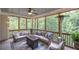 Outdoor patio featuring comfortable seating, string lights, ceiling fan, and a green view at 16 Cambridge Way, Cartersville, GA 30121