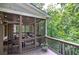 Outdoor patio featuring comfortable seating, string lights, and a green view at 16 Cambridge Way, Cartersville, GA 30121