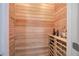 Compact wine cellar with wooden racks and shelving to showcase curated collection at 16 Cambridge Way, Cartersville, GA 30121