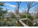 Landscaped backyard featuring mature trees and lush greenery at 818 Virgil Ne St, Atlanta, GA 30307