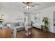Bright and airy living room with hardwood floors, a comfortable gray sofa, and a charming window bench seat at 818 Virgil Ne St, Atlanta, GA 30307