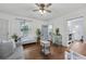 Charming living room with hardwood floors, a comfortable gray sofa, and an open layout, ideal for entertaining guests at 818 Virgil Ne St, Atlanta, GA 30307
