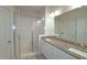 Bathroom with double sink vanity, granite counter, glass shower at 2163 Wiggins Walk, Atlanta, GA 30316
