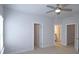 Bright bedroom features neutral paint, base trim, and ceiling fan at 2163 Wiggins Walk, Atlanta, GA 30316