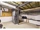 The basement is unfinished with exposed piping and concrete floors at 2197 Spring Walk Ct, Atlanta, GA 30341