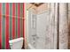 Cozy bathroom with shower and tub, toilet, and towel bar at 2197 Spring Walk Ct, Atlanta, GA 30341