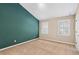 Large bedroom with vaulted ceiling, two windows, and neutral carpet for a relaxing space at 2197 Spring Walk Ct, Atlanta, GA 30341