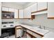 Functional kitchen with white appliances, ample counter space, and plenty of storage at 2197 Spring Walk Ct, Atlanta, GA 30341