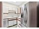 Bright kitchen featuring stainless steel refrigerator and dishwasher at 2197 Spring Walk Ct, Atlanta, GA 30341