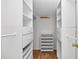 Walk-in closet with shelving units and drawers at 2197 Spring Walk Ct, Atlanta, GA 30341