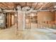 Unfinished basement featuring exposed framing, ductwork, and concrete floor, offering a blank canvas for customization at 1290 Mount Mckinley Dr, Grayson, GA 30017