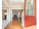 Inviting entryway with hardwood floors, opening into a spacious living area with a fireplace at 1290 Mount Mckinley Dr, Grayson, GA 30017