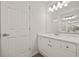 Bathroom featuring a modern sink, vanity, and large mirror at 1902 Connemara Dr, Atlanta, GA 30341