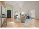 Bright living room with hardwood floors, high ceilings, a fireplace and neutral-toned furniture at 1902 Connemara Dr, Atlanta, GA 30341