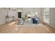 Bright living room with hardwood floors, high ceilings, a fireplace and neutral-toned furniture at 1902 Connemara Dr, Atlanta, GA 30341