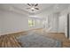 Living room featuring a ceiling fan, recessed lighting, and wooden floors at 1902 Connemara Dr, Atlanta, GA 30341