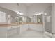 Modern bathroom boasts double sinks, sleek cabinets, and a walk-in shower at 1902 Connemara Dr, Atlanta, GA 30341