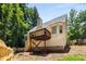 Home with a wooden deck and an enclosed backyard at 7167 Stonebrook Ln, Lithonia, GA 30058