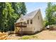 Exterior view of home showcasing deck and fenced-in yard at 7167 Stonebrook Ln, Lithonia, GA 30058