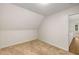 Cozy bedroom features neutral carpet, textured ceilings, and plenty of natural light at 7167 Stonebrook Ln, Lithonia, GA 30058