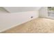 This carpeted bedroom features neutral paint and one window at 7167 Stonebrook Ln, Lithonia, GA 30058