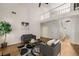 Open concept living room with vaulted ceilings, a fireplace, and hardwood floors at 7167 Stonebrook Ln, Lithonia, GA 30058