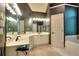 Bathroom features a vanity with a mirror, drawers, cabinets, and a hair dryer at 1850 Noblin Ridge Way, Duluth, GA 30097