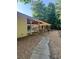Community picnic area showcasing picnic tables and a barbecue pit at 1850 Noblin Ridge Way, Duluth, GA 30097