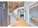 Spacious foyer with hardwood floors, elegant staircase and views to the upstairs hallway at 1850 Noblin Ridge Way, Duluth, GA 30097