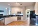 Kitchen with granite counters, stainless steel appliances and white cabinets at 1850 Noblin Ridge Way, Duluth, GA 30097