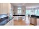 A kitchen featuring granite counters, stainless steel appliances and white cabinetry at 1850 Noblin Ridge Way, Duluth, GA 30097