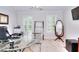 Office with a glass desk, a large mirror, and neutral walls at 1850 Noblin Ridge Way, Duluth, GA 30097