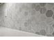 Close-up of the stylish kitchen backsplash featuring a gray geometric tile design at 614 Denali Dr, Mableton, GA 30126
