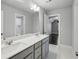 Spacious bathroom with double sink vanity and a view into the adjacent rooms at 614 Denali Dr, Mableton, GA 30126
